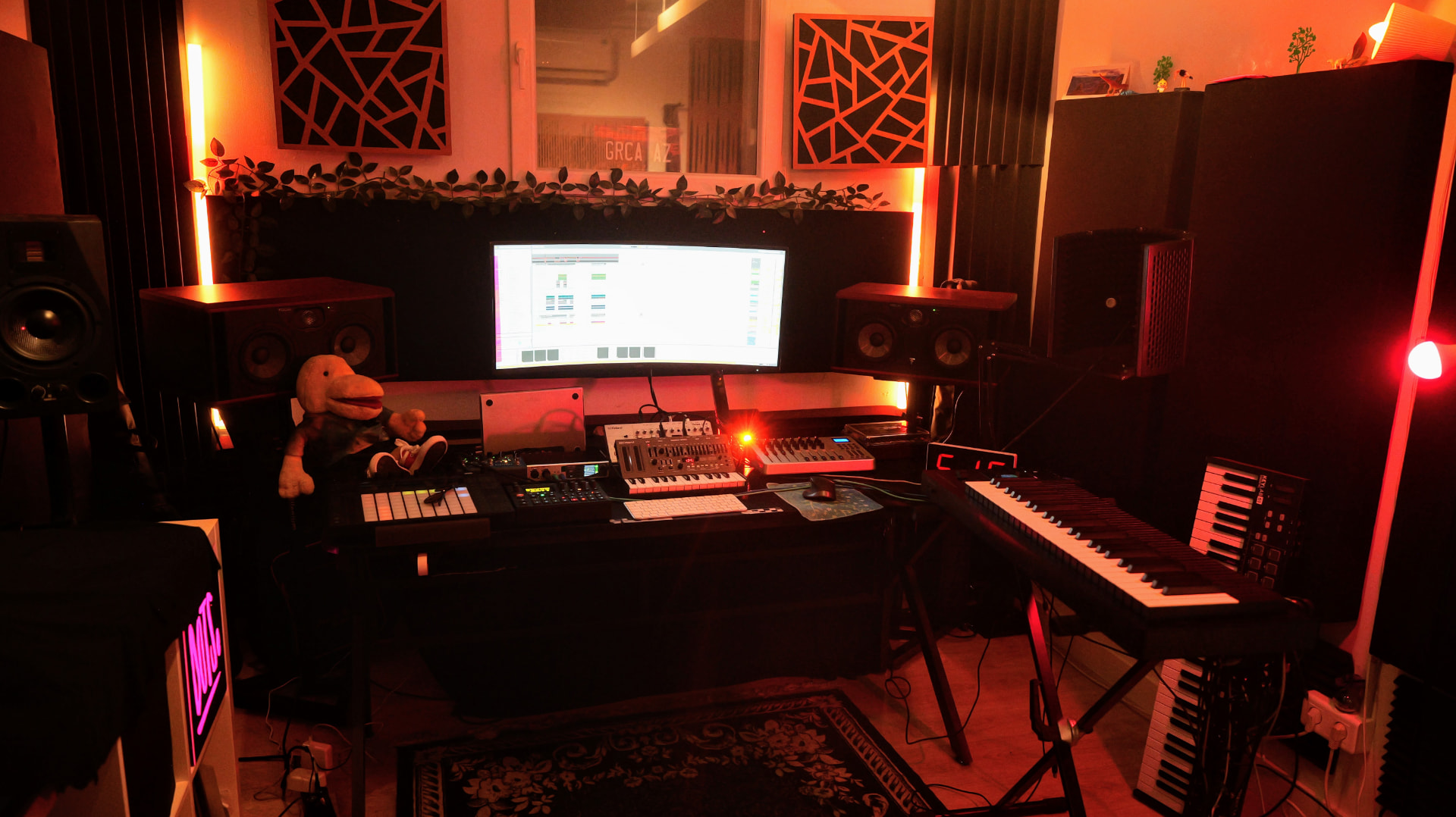 Alex Cristea's music studio in Barcelona, lit in warm red